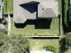 Aerial view of a fenced in backyard with a well maintained yard at 1342 Salmonberry St, Wesley Chapel, FL 33543