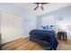 Charming bedroom featuring a comfortable bed and a ceiling fan at 1342 Salmonberry St, Wesley Chapel, FL 33543