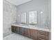 Double vanity bathroom with marble countertop at 2912 W Santiago St # 1901, Tampa, FL 33629