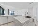 Modern kitchen with marble countertops and high-end fixtures at 2912 W Santiago St # 1901, Tampa, FL 33629