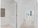 Bright hallway with modern doors and flooring, leading to other rooms at 2912 W Santiago St # 1901, Tampa, FL 33629