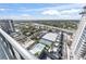Aerial view showcasing pool, tennis court, and city views at 2912 W Santiago St # 1901, Tampa, FL 33629