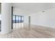 Bright living room with expansive windows and water views at 2912 W Santiago St # 1901, Tampa, FL 33629