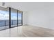 Bedroom with floor to ceiling windows and water views at 2912 W Santiago St # 1901, Tampa, FL 33629