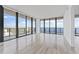 Bright living room with floor to ceiling windows and stunning water views at 2912 W Santiago St # 1901, Tampa, FL 33629
