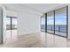 Spacious bedroom with floor-to-ceiling windows and water views at 2912 W Santiago St # 1901, Tampa, FL 33629