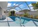 Refreshing screened pool perfect for summer at 12174 Laramore St, Spring Hill, FL 34608