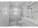 Modern bathroom with marble shower and vanity at 12174 Laramore St, Spring Hill, FL 34608