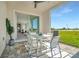 Outdoor patio with table and chairs, perfect for relaxing and entertaining at 31873 Anchor Point Dr, Wesley Chapel, FL 33545