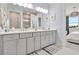 Double vanity bathroom with modern fixtures and a stylish design at 31873 Anchor Point Dr, Wesley Chapel, FL 33545