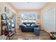 Relaxing living room with comfortable seating and large window at 1342 Salmonberry St, Wesley Chapel, FL 33543