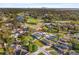 Aerial view of the property near a golf course and body of water at 4101 Cortez S Way, St Petersburg, FL 33712