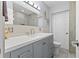Updated bathroom with modern vanity and tile flooring at 4101 Cortez S Way, St Petersburg, FL 33712