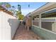 Outdoor shower and side yard with brick pavers at 4101 Cortez S Way, St Petersburg, FL 33712
