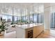 Open concept kitchen with city views and wine cooler at 1000 Water St # 1103, Tampa, FL 33602