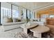 Spacious living room with sectional sofa and city views at 1000 Water St # 1103, Tampa, FL 33602