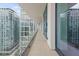 Expansive balcony with glass railings and city views at 1000 Water St # 1103, Tampa, FL 33602