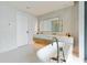 Bathroom with double vanity and freestanding tub at 1000 Water St # 1103, Tampa, FL 33602