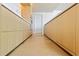 Modern kitchen with light wood cabinets and marble backsplash at 1000 Water St # 1103, Tampa, FL 33602