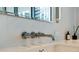 Modern bathroom sink and wall-mounted faucet at 1000 Water St # 1103, Tampa, FL 33602
