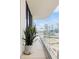 Spacious balcony with city views and potted plants at 1000 Water St # 1103, Tampa, FL 33602