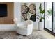 Relaxing living room with comfy seating and large artwork at 1000 Water St # 1103, Tampa, FL 33602