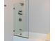 Bathtub with glass shower partition and shelf at 1000 Water St # 1103, Tampa, FL 33602