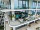 Large balcony overlooking the pool and city skyline at 1000 Water St # 1103, Tampa, FL 33602