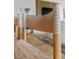 Modern light beige leather dining chairs with wooden legs at 1000 Water St # 1103, Tampa, FL 33602