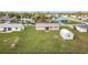 Aerial view of house and surrounding neighborhood at 7518 Lyncrest St, North Port, FL 34287