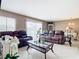 Relaxing living room featuring comfortable leather furniture at 7518 Lyncrest St, North Port, FL 34287