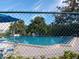 Inviting community pool with surrounding patio furniture at 2625 State Road 590 # 2412, Clearwater, FL 33759