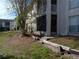 Ground level apartment with a screened-in patio and yard at 2625 State Road 590 # 2412, Clearwater, FL 33759