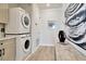 Stackable washer and dryer in a laundry room at 31879 Anchor Point Dr, Wesley Chapel, FL 33545