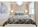 Bright bedroom with a comfortable bed and stylish decor at 31879 Anchor Point Dr, Wesley Chapel, FL 33545
