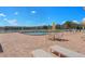 Inviting pool area with lounge chairs and patio tables at 1950 59Th N Ave # 318, St Petersburg, FL 33714