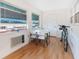 Bright sunroom with table and chairs, perfect for relaxing at 1950 59Th N Ave # 318, St Petersburg, FL 33714