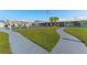 Well-maintained community lawn with paved pathways at 1950 59Th N Ave # 318, St Petersburg, FL 33714