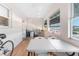 Spacious sunroom with table and chairs, offers extra living space at 1950 59Th N Ave # 318, St Petersburg, FL 33714