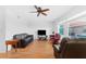 Living room with hardwood floors, leather furniture, and a view at 1950 59Th N Ave # 318, St Petersburg, FL 33714
