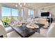 Modern dining room with table, chairs, and view of the backyard at 31885 Anchor Point Dr, Wesley Chapel, FL 33545