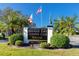 Seminole Lake Country Club Estates entrance sign at 6911 Greenbrier Dr, Seminole, FL 33777