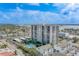 Aerial view of high rise building and waterfront at 400 Island Way # 103, Clearwater Beach, FL 33767