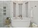 Elegant bathroom with freestanding bathtub and marble accents at 6211 Emmons Ln, Tampa, FL 33647