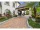 Grand entrance with a large double door and a beautifully landscaped walkway at 6211 Emmons Ln, Tampa, FL 33647