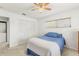 Spacious bedroom with a queen bed and ample closet space at 1454 Normandy Park Dr # 1, Clearwater, FL 33756