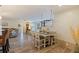 Charming dining area with a rustic table and seating for four, perfect for casual meals at 165 4Th N Ave, Tierra Verde, FL 33715