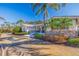 House exterior featuring landscaping and a paved driveway at 165 4Th N Ave, Tierra Verde, FL 33715