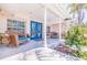 Charming front porch with inviting rocking chairs offering a tranquil place to sit and enjoy the views at 165 4Th N Ave, Tierra Verde, FL 33715