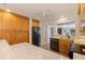Spacious kitchen with stainless appliances, wood cabinets and marble countertops at 165 4Th N Ave, Tierra Verde, FL 33715